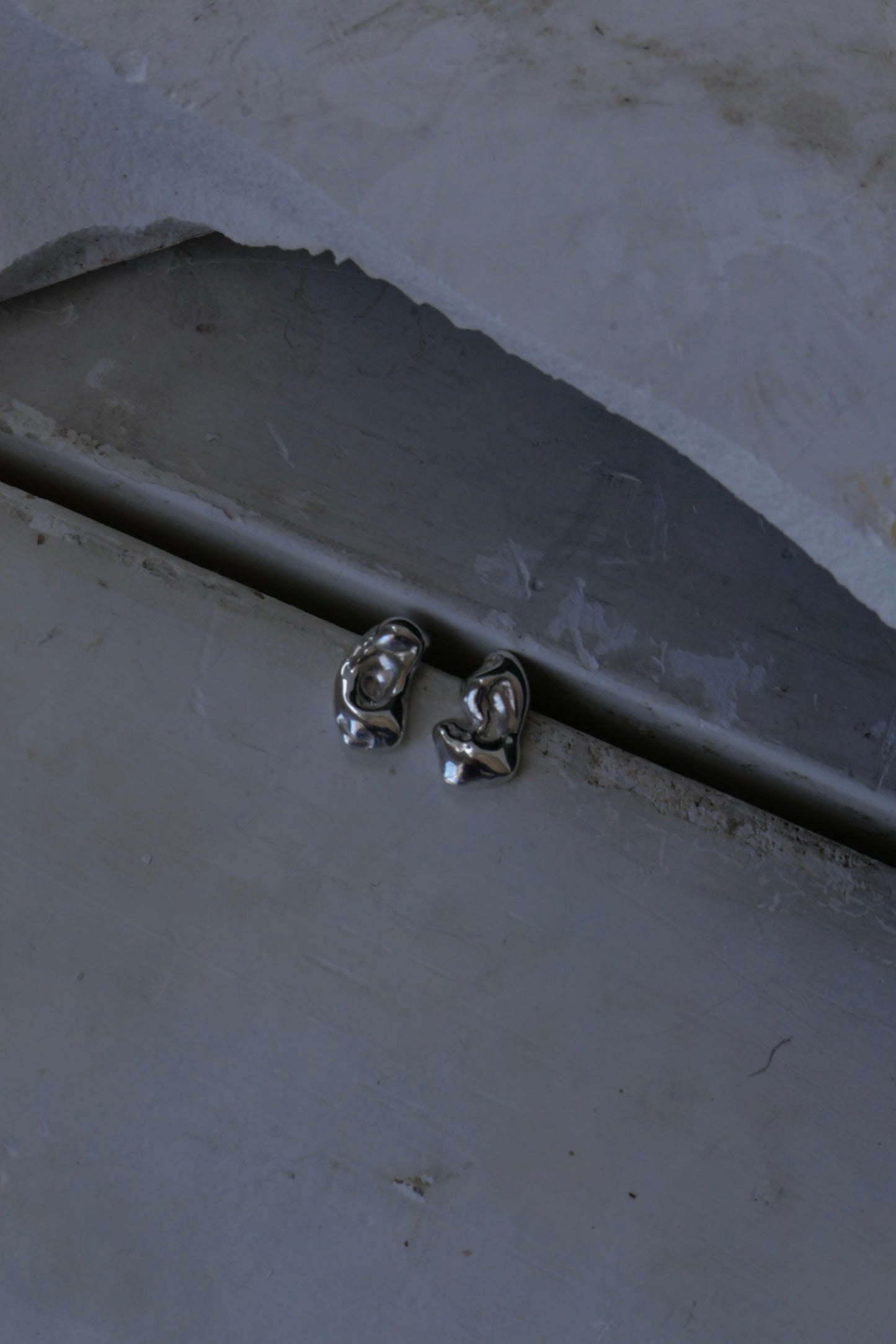 Recycled silver tension pool stud earrings by nowhere soon studio