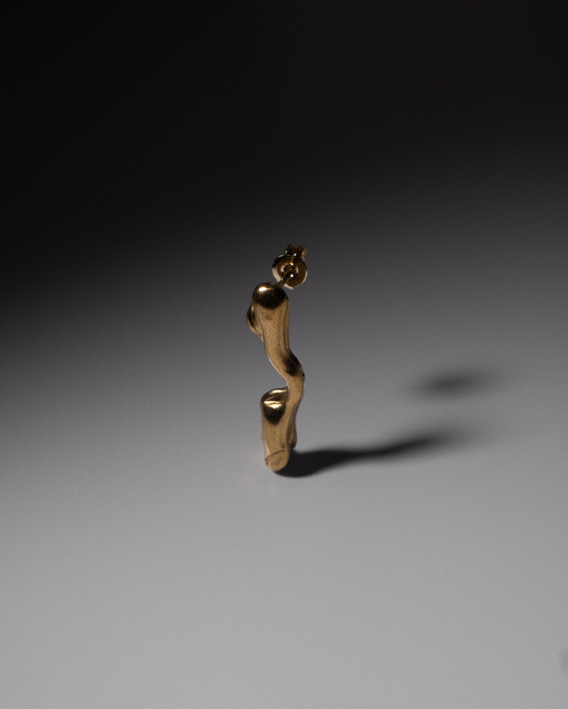 Handcrafted unique gold dangle drop abstract organic earring.