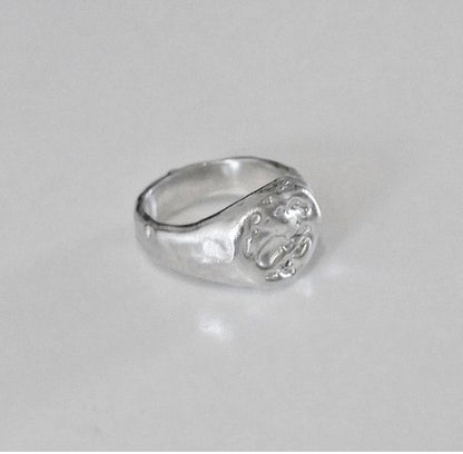 Modern abstract silver signet ring. Handcrafted and handmade unique gold and silver jewellery.