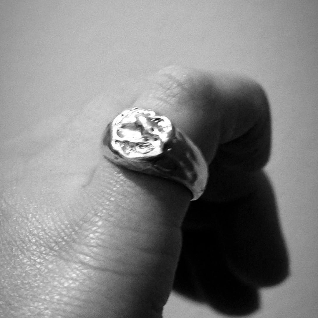 Modern abstract silver signet ring. Handcrafted and handmade unique gold and silver jewellery.